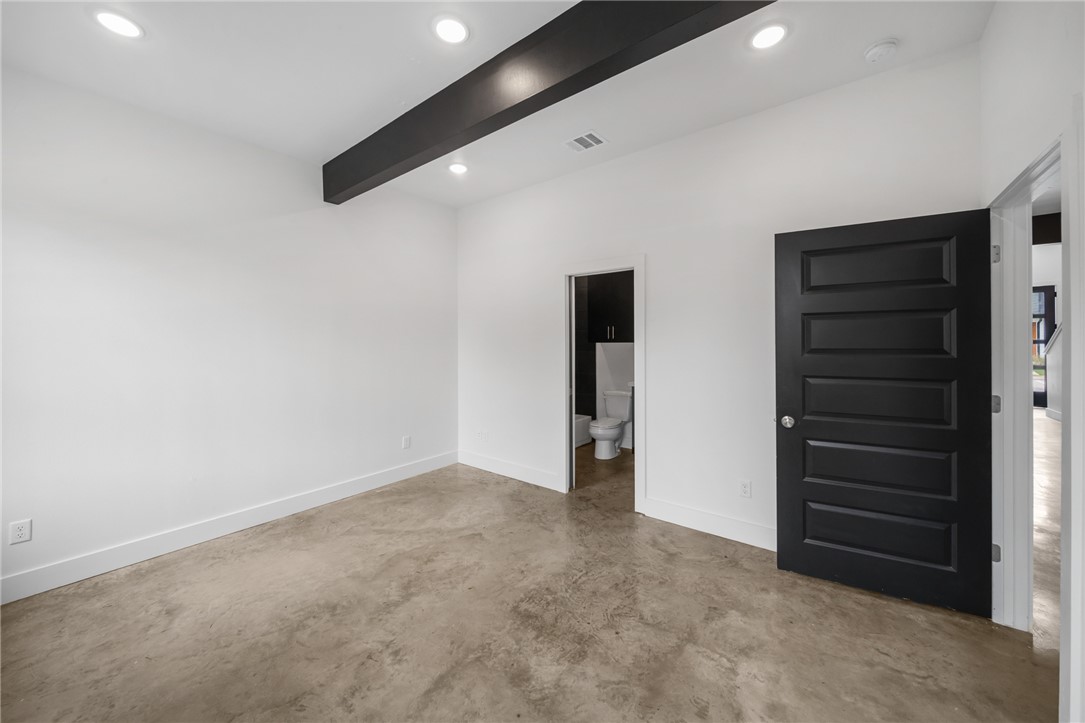 213 Lynn Drive, Unit 202 Bryan, TX 77801 - Photo 24 of 28 a view of an empty walk in closet