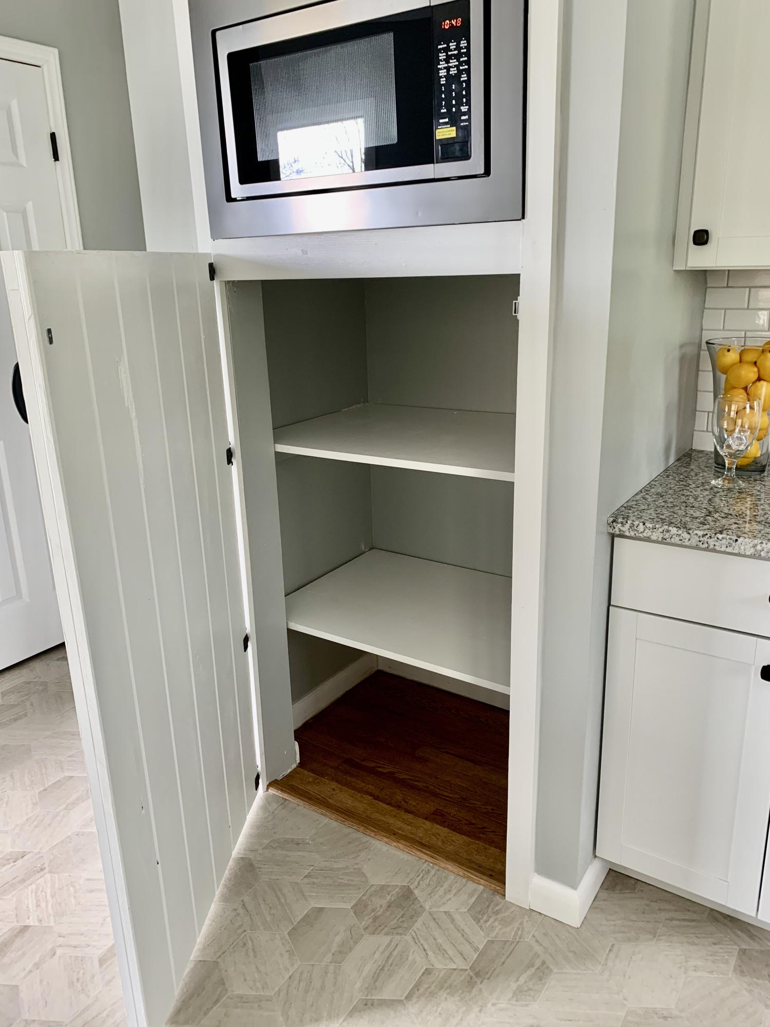 109 Henley Road Oak Ridge, TN 37830 - Photo 13 of 40 KitchenMicrowaveCabinetOpen