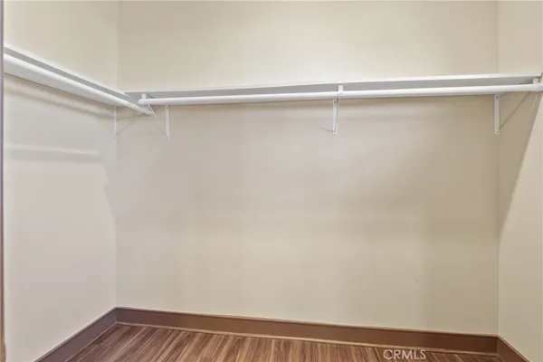 a view of an empty walk in closet