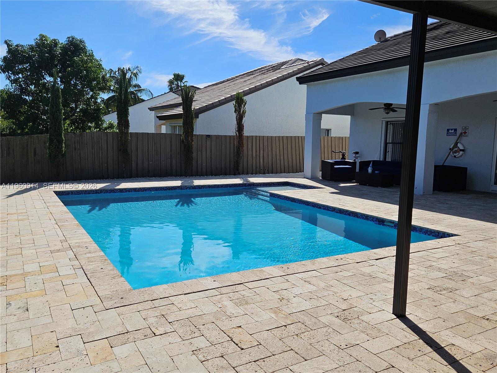 7301 Southwest 159th Avenue, Unit 1 Miami, FL 33193 - Photo 7 of 10 a view of a backyard
