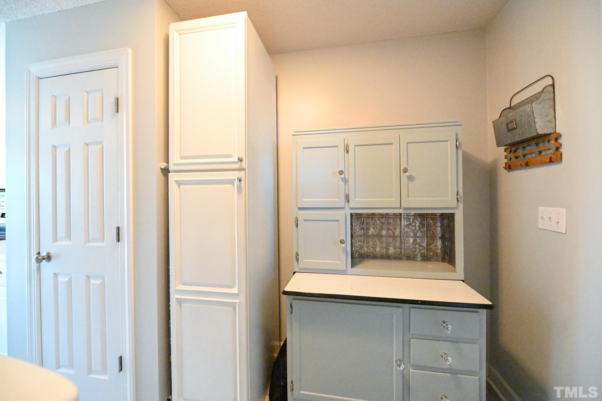 4071 Bizzell Grove Church Road Princeton, NC 27569 - Photo 19 of 53 a bathroom with a granite countertop sink and mirror