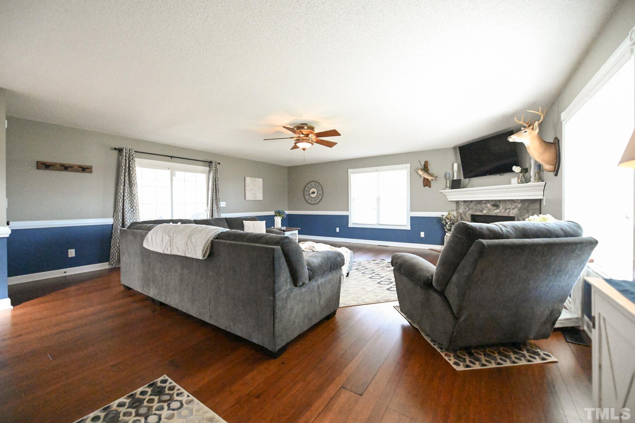 4071 Bizzell Grove Church Road Princeton, NC 27569 - Photo 22 of 53 a living room with furniture window and wooden floor