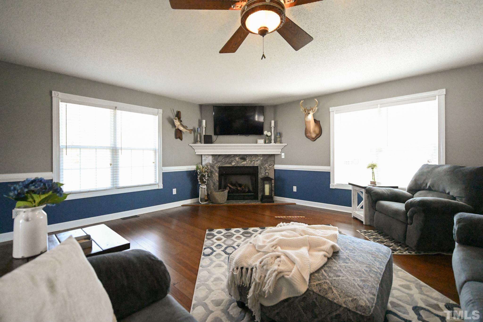 4071 Bizzell Grove Church Road Princeton, NC 27569 - Photo 23 of 53 a living room with furniture fireplace and window