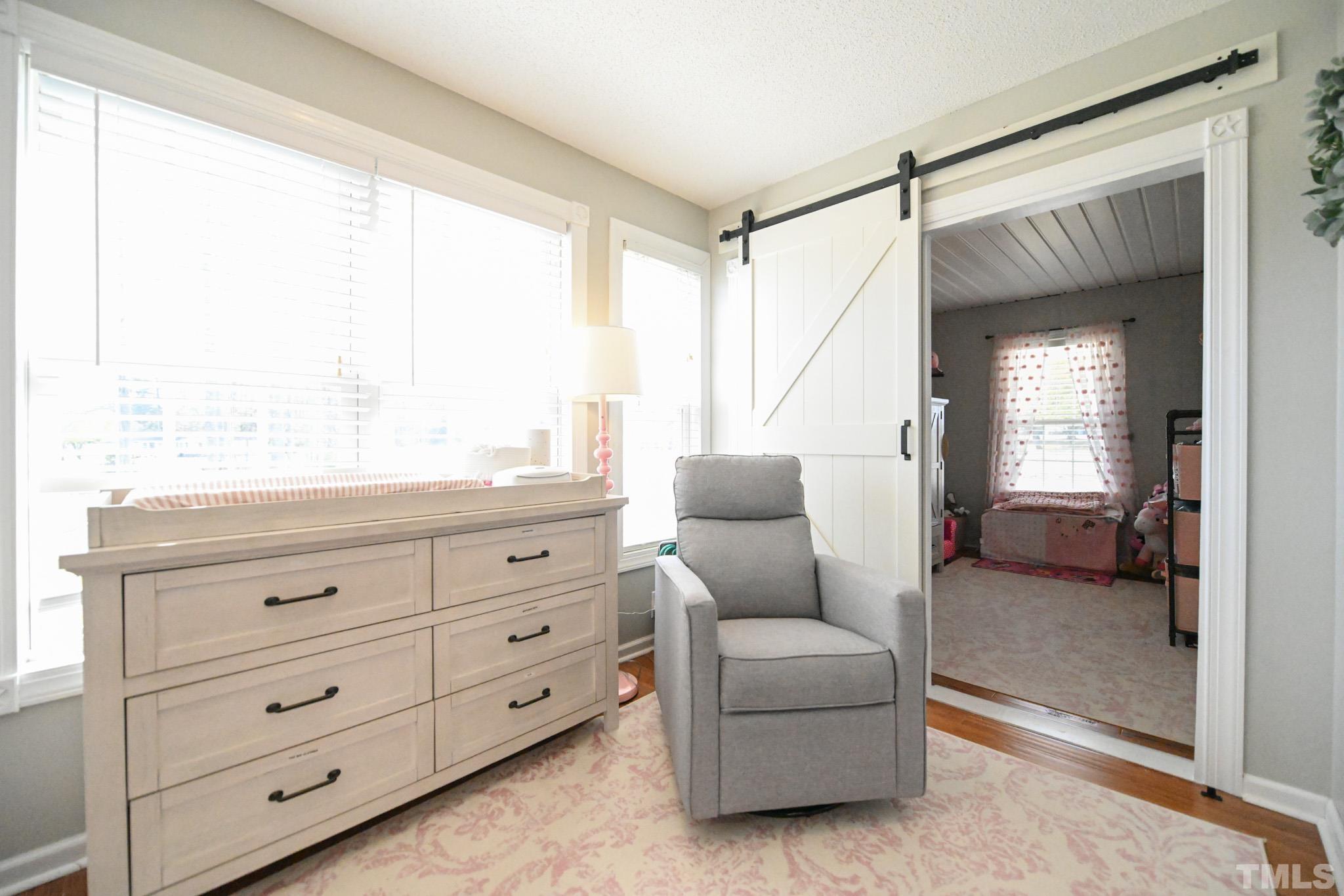 4071 Bizzell Grove Church Road Princeton, NC 27569 - Photo 35 of 53 a living room with furniture and a window