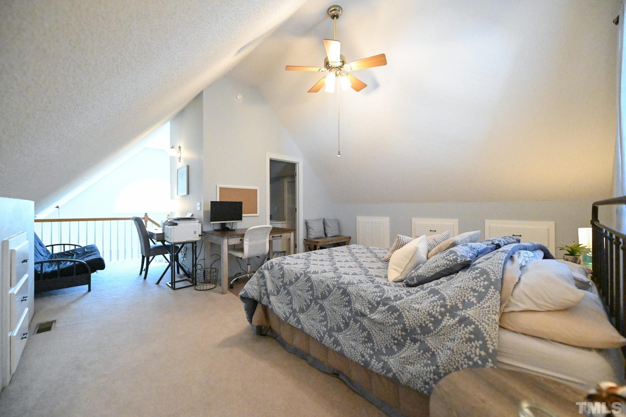 4071 Bizzell Grove Church Road Princeton, NC 27569 - Photo 42 of 53 a bedroom with furniture and a chandelier