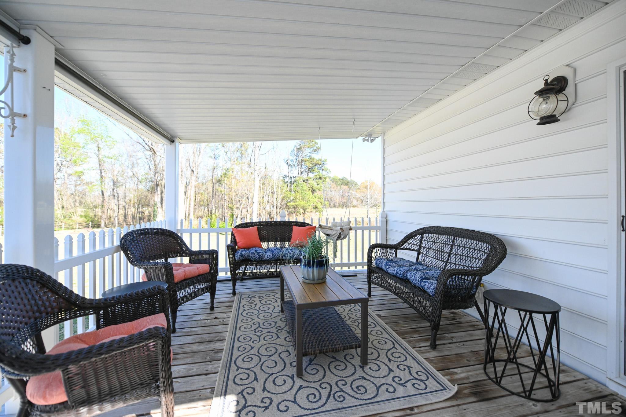 4071 Bizzell Grove Church Road Princeton, NC 27569 - Photo 46 of 53 a living room with furniture and a window