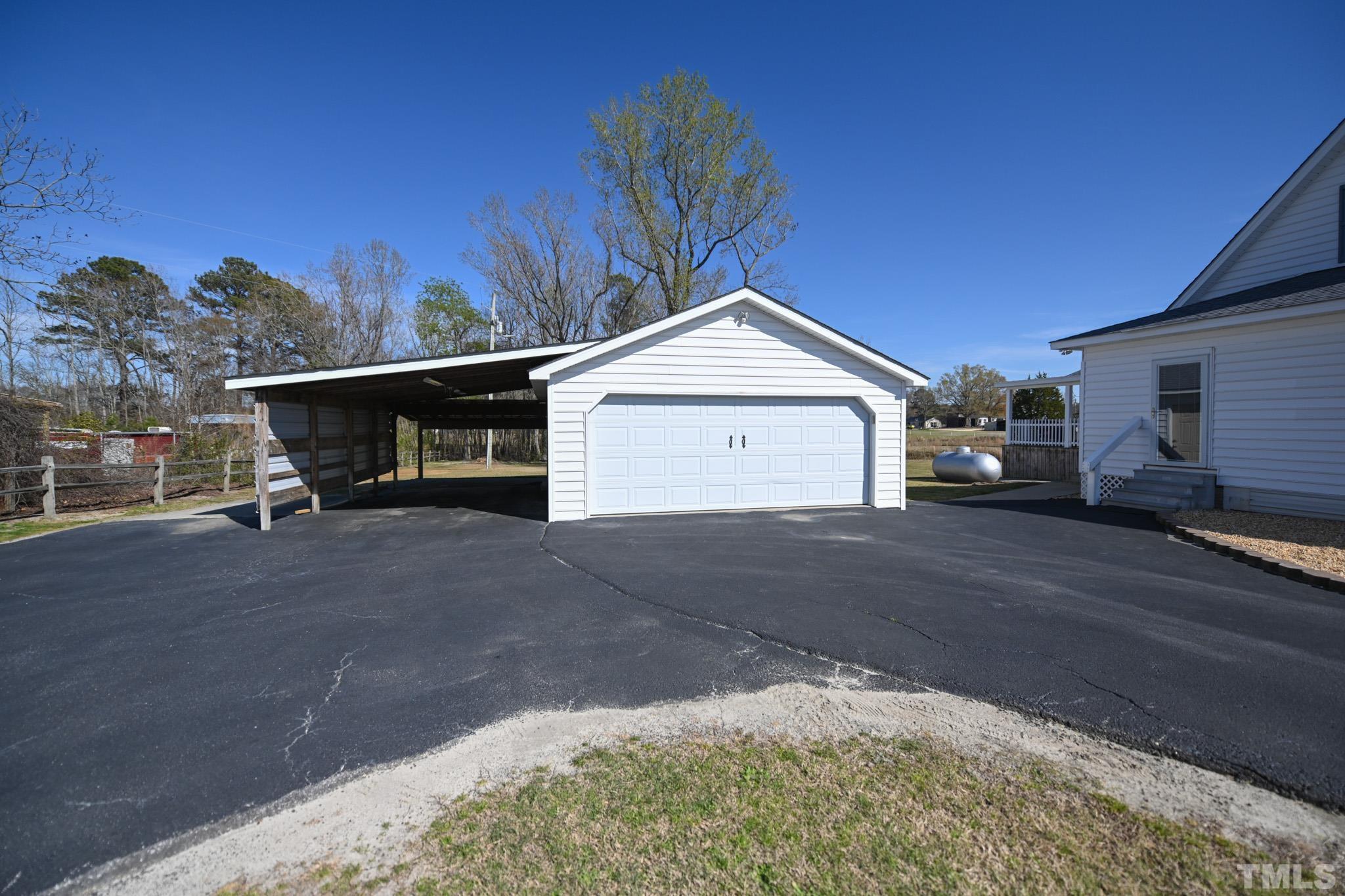 4071 Bizzell Grove Church Road Princeton, NC 27569 - Photo 48 of 53 a view of a car in front of a house