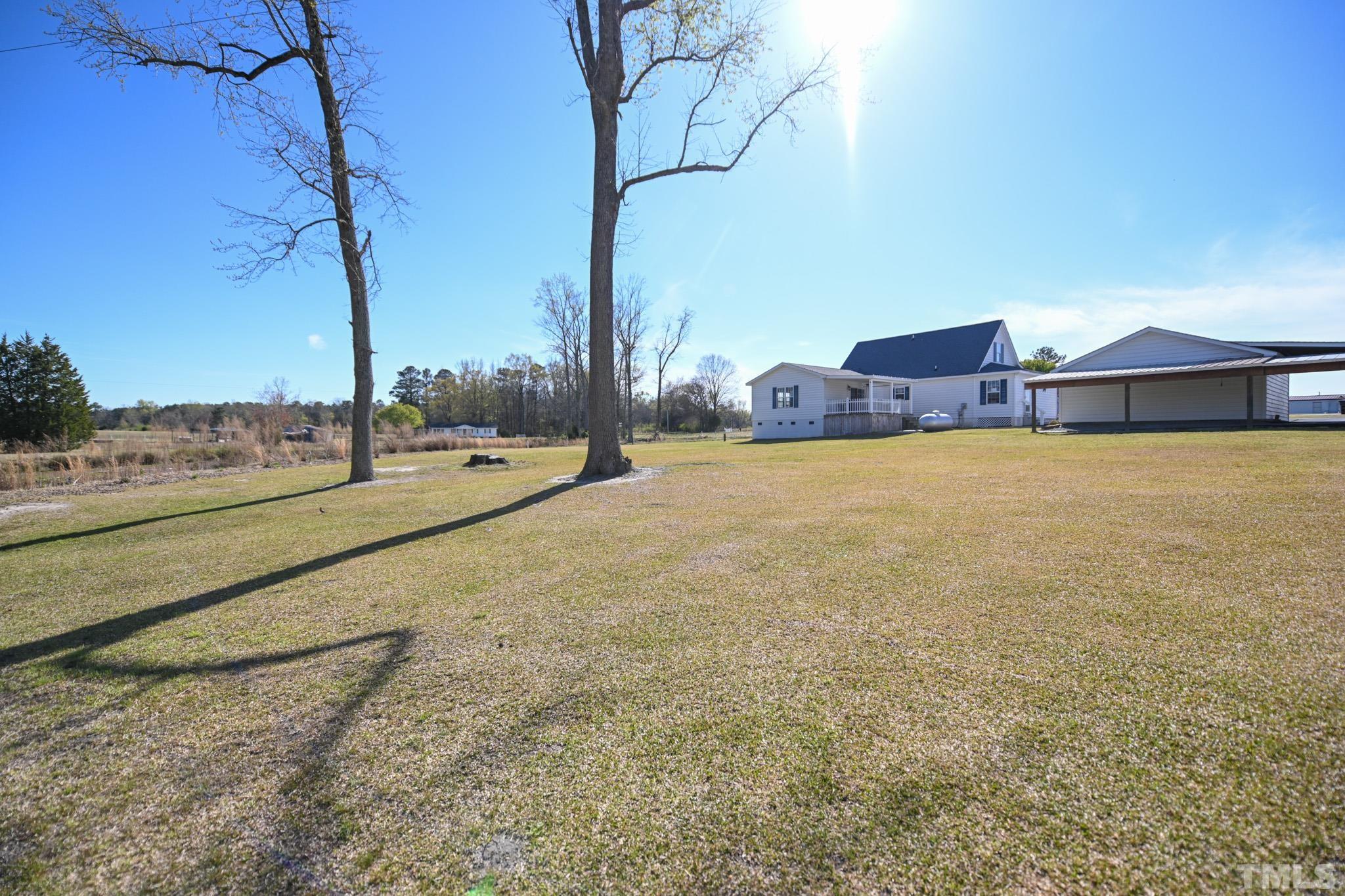 4071 Bizzell Grove Church Road Princeton, NC 27569 - Photo 53 of 53 a view of an outdoor space and a yard