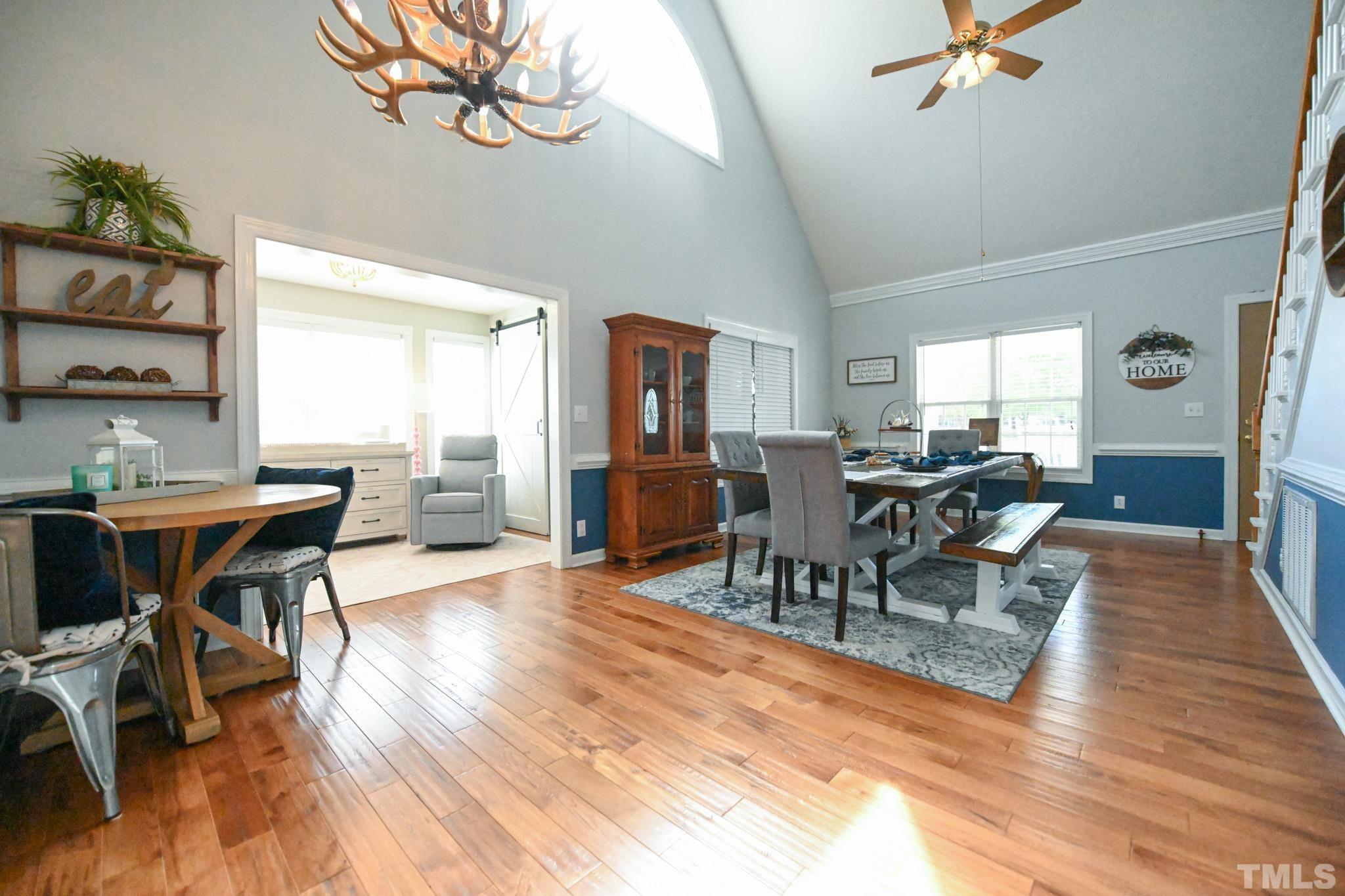4071 Bizzell Grove Church Road Princeton, NC 27569 - Photo 10 of 53 a view of a dining room with furniture and wooden floor