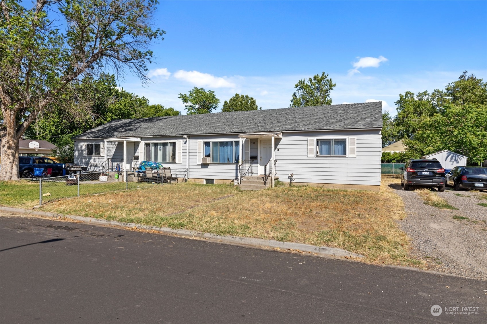 508 Delafield Avenue Richland, WA 99352 - Photo 16 of 22 a house with trees in the background