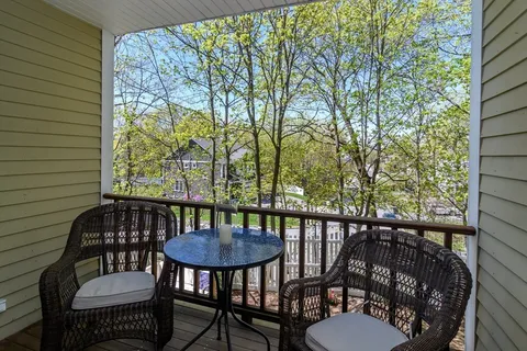 a view of a patio in a balcony