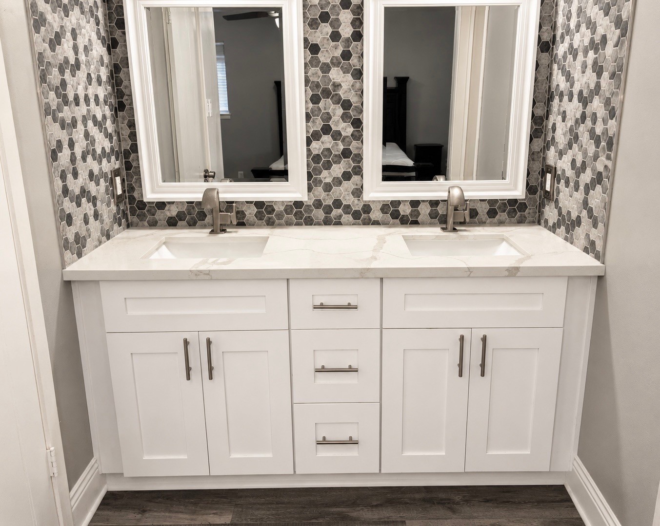 11939 Paramount Lane Houston, TX 77067 - Photo 6 of 9 a bathroom with a sink and a mirror