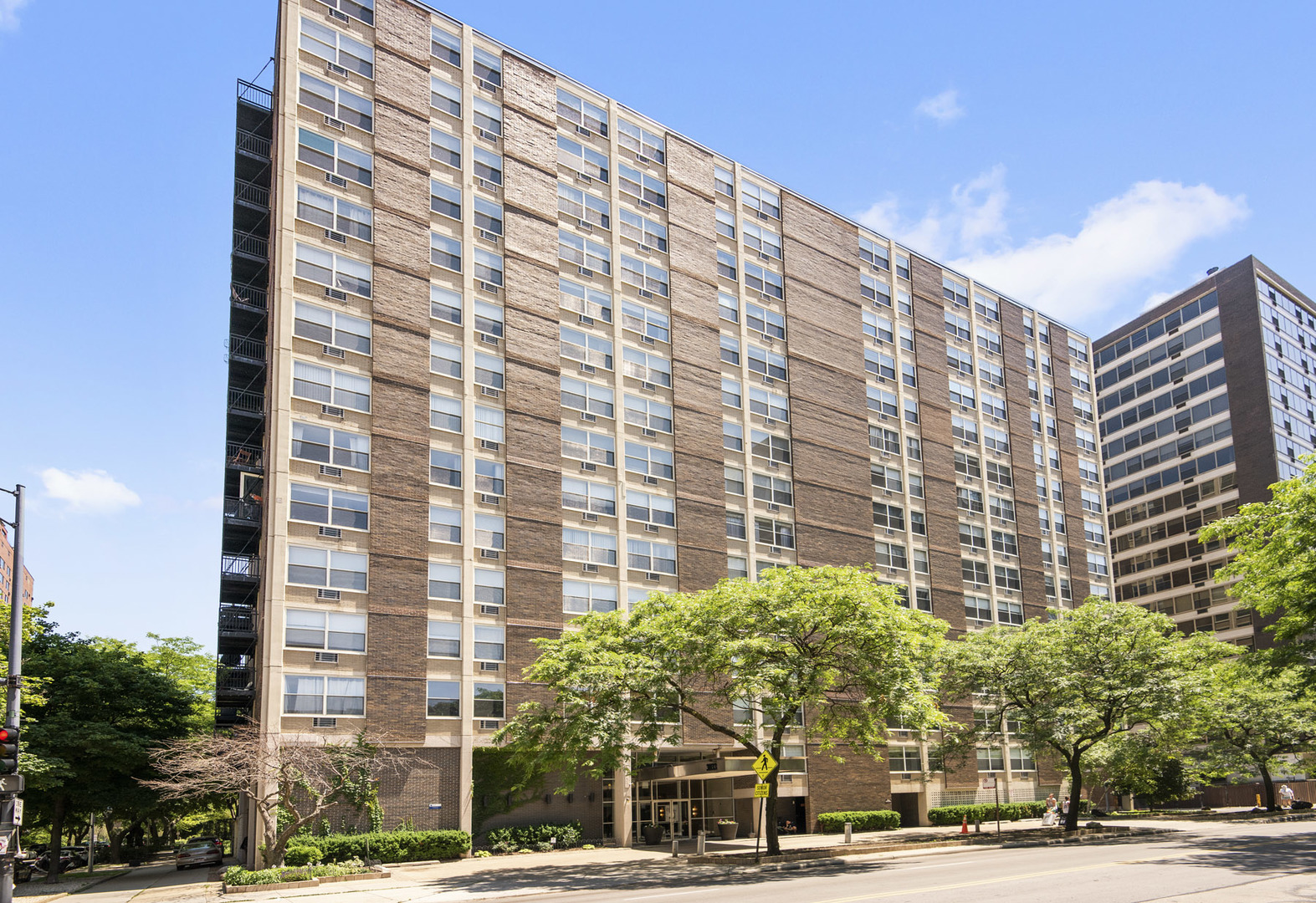 3033 North Sheridan Road, Unit 605 Chicago, IL 60657 - Photo 1 of 13 a view of a building and a street