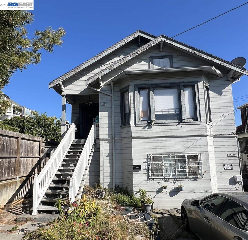a front view of a house with balcony