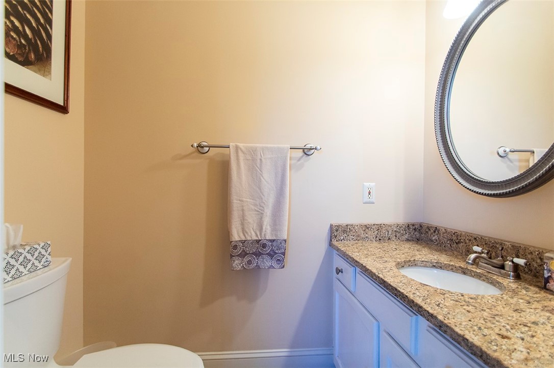 4041 Huffman Road Medina, OH 44256 - Photo 16 of 40 Bathroom with vanity and toilet