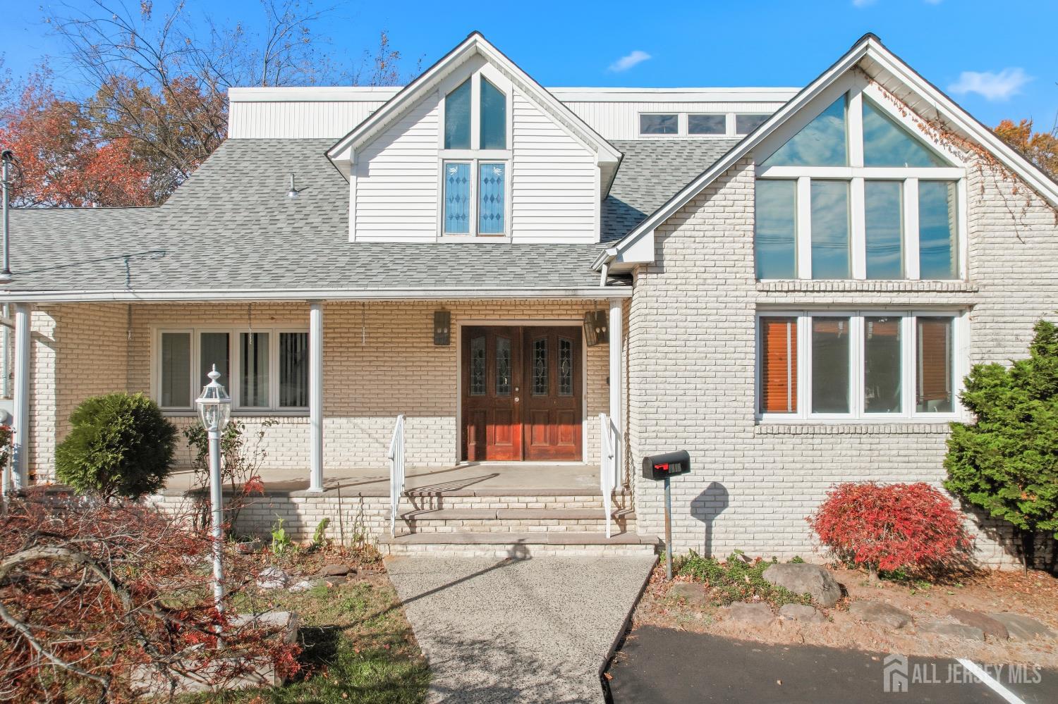 1818 Oak Tree Road Edison, NJ 08820 - Photo 2 of 15 a front view of a house