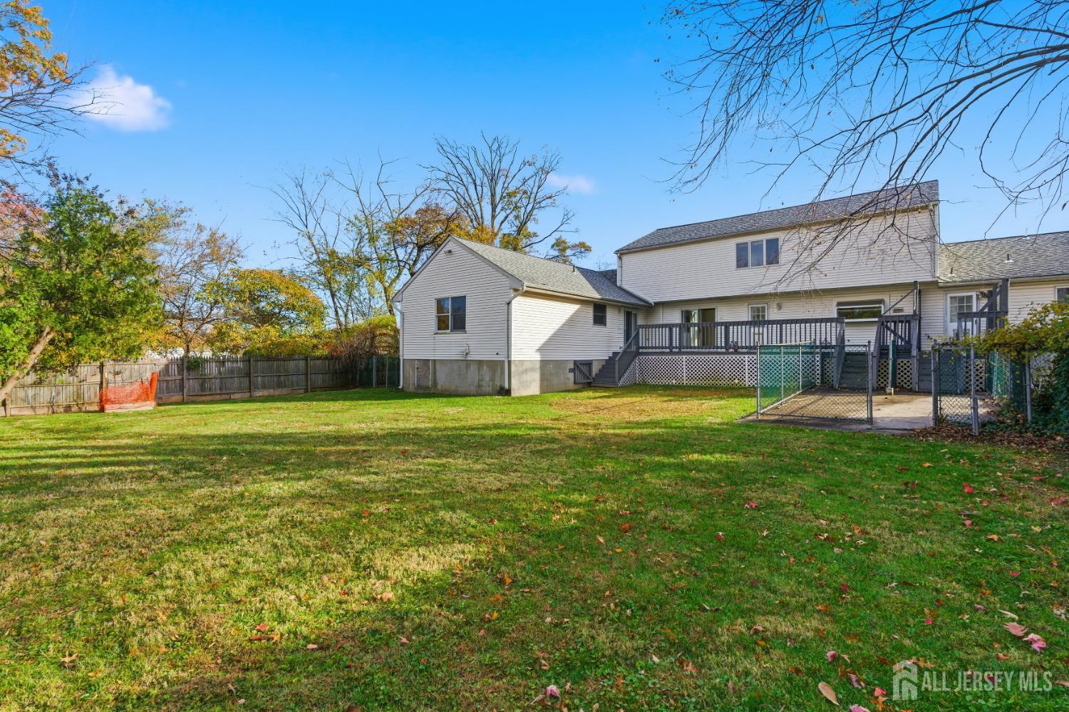 1818 Oak Tree Road Edison, NJ 08820 - Photo 4 of 15 a front view of house with yard and seating area