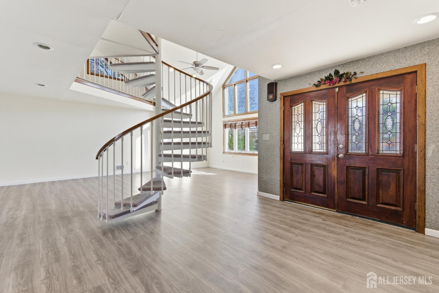 1818 Oak Tree Road Edison, NJ 08820 - Photo 6 of 15 a view of entryway and hall with wooden floor