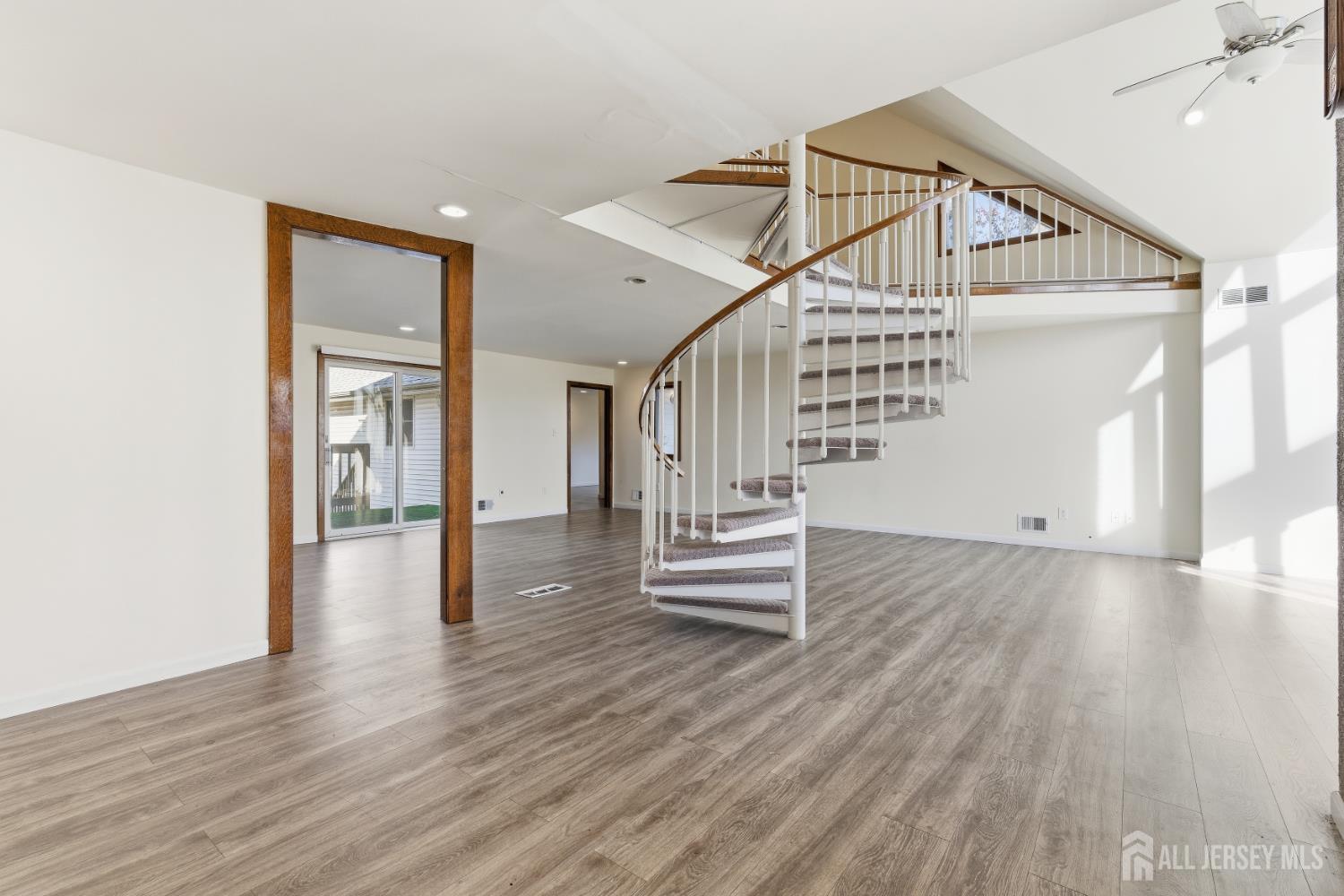 1818 Oak Tree Road Edison, NJ 08820 - Photo 8 of 15 a view of entryway and hall with wooden floor
