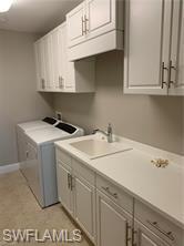 16390 Viansa Way, Unit 1202 Naples, FL 34110 - Photo 19 of 26 a utility room with sink dryer and washer