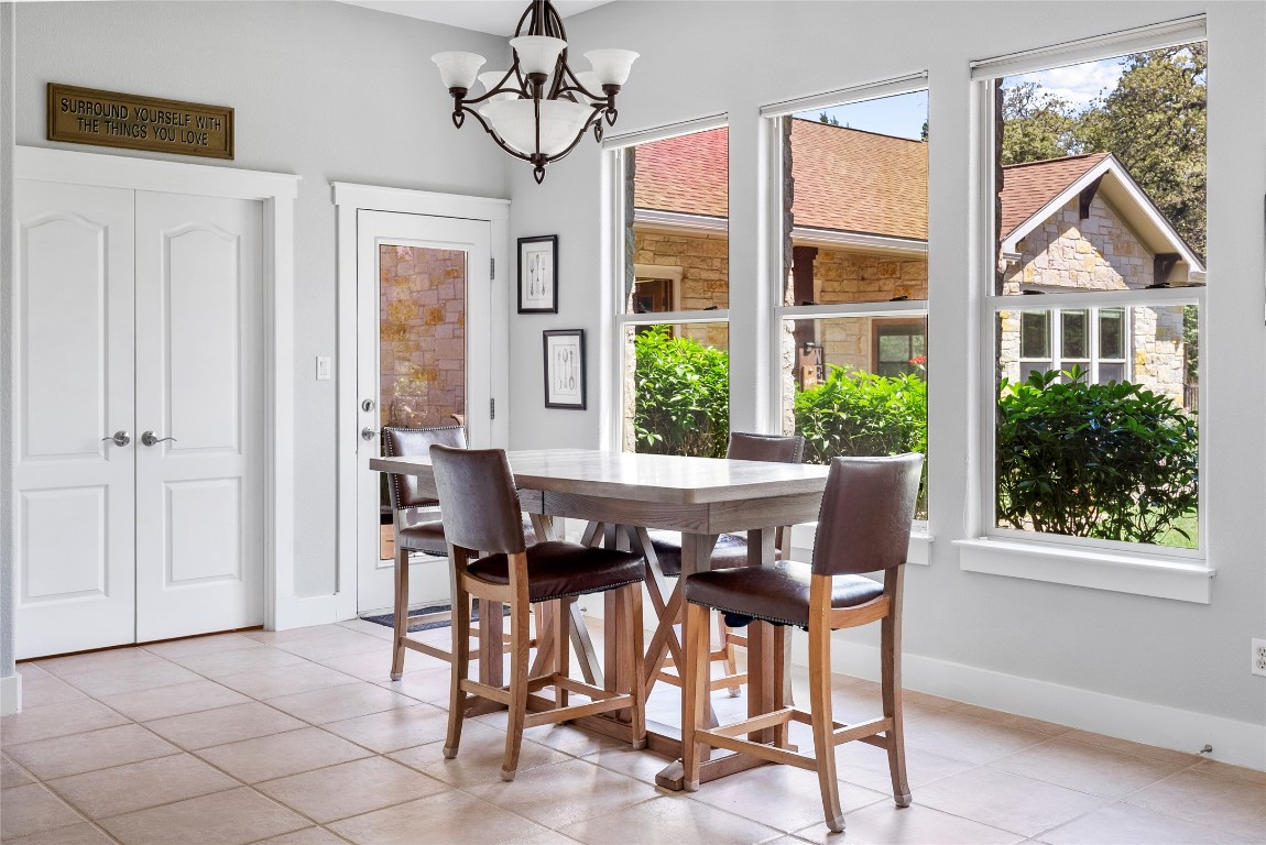 119 Maple Leaf Trail Elgin, TX 78621 - Photo 13 of 40 a view of a dining room with furniture window and outside view