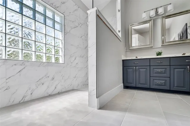 a view of a kitchen with cabinets