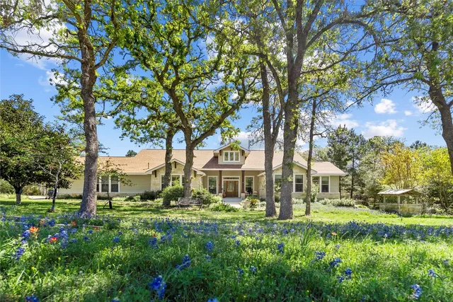 a view of house with yard