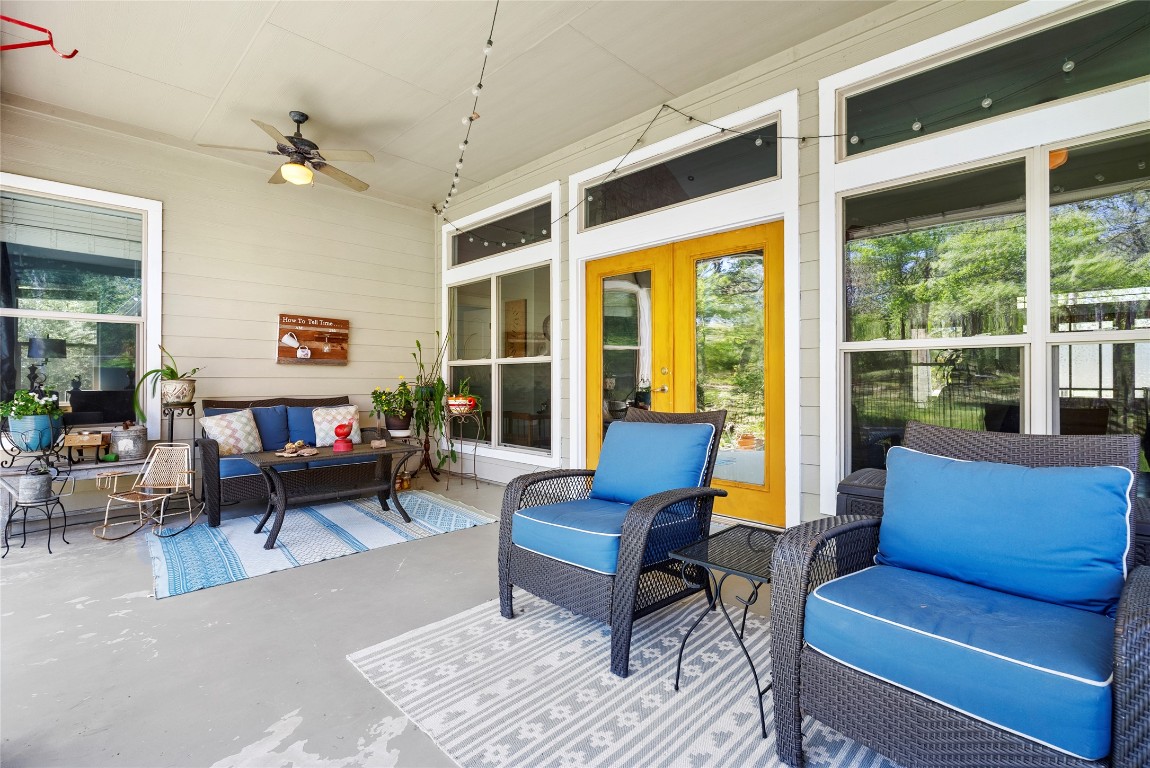 119 Maple Leaf Trail Elgin, TX 78621 - Photo 26 of 40 a living room with furniture and a large window
