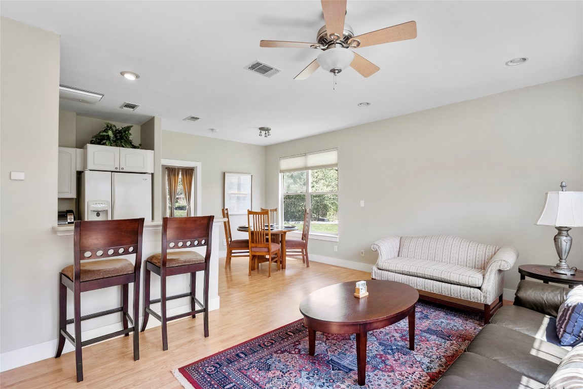 119 Maple Leaf Trail Elgin, TX 78621 - Photo 28 of 40 a living room with furniture a rug and a large window