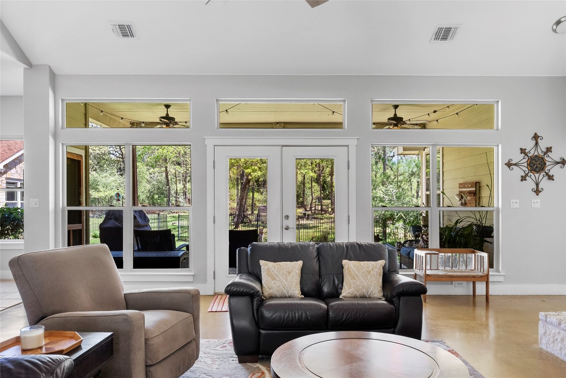 119 Maple Leaf Trail Elgin, TX 78621 - Photo 7 of 40 a living room with furniture and a large window