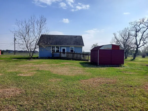 a bathroom with a sink toilet mirror and vanity