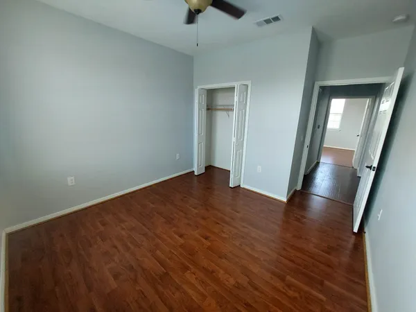 a kitchen with stainless steel appliances a refrigerator and a stove top oven