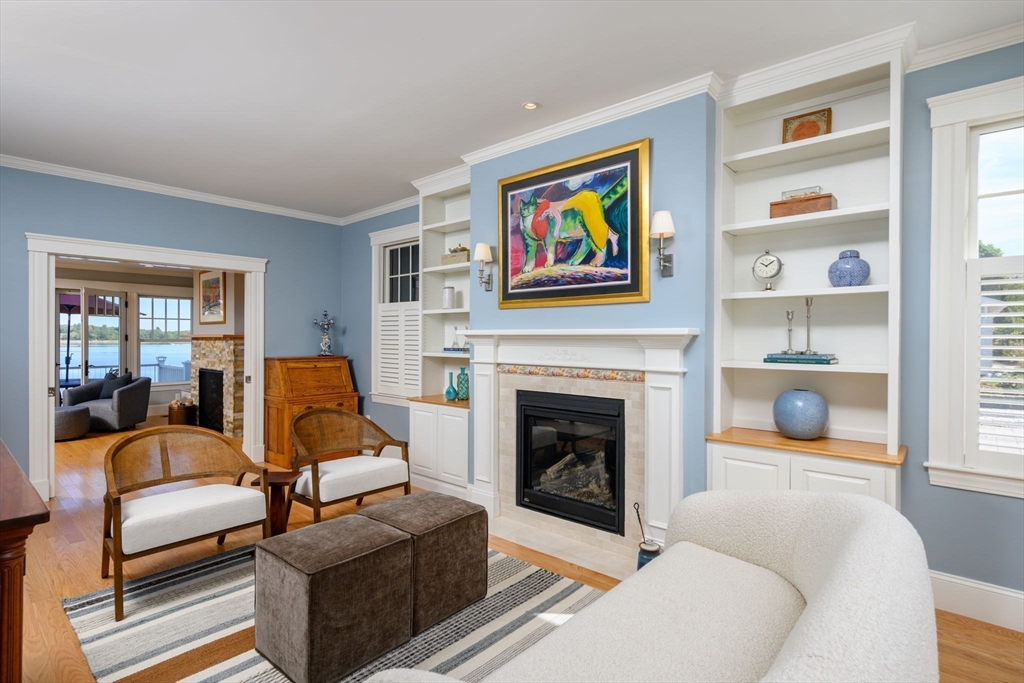 171 Otis Street Hingham, MA 02043 - Photo 12 of 29 a living room with furniture or couch and a fireplace