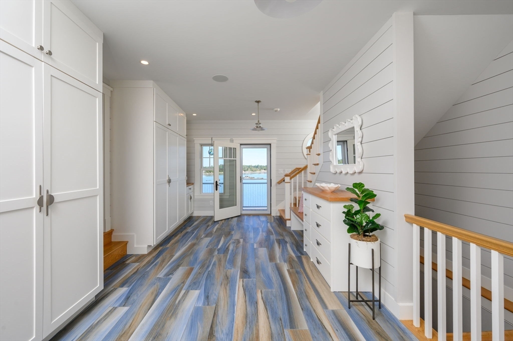 171 Otis Street Hingham, MA 02043 - Photo 13 of 29 a view of a house with wooden floor