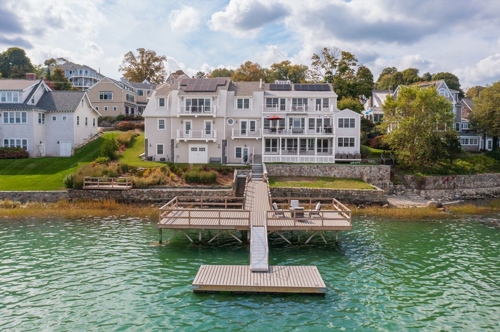 171 Otis Street Hingham, MA 02043 - Photo 5 of 29 a front view of building with garden
