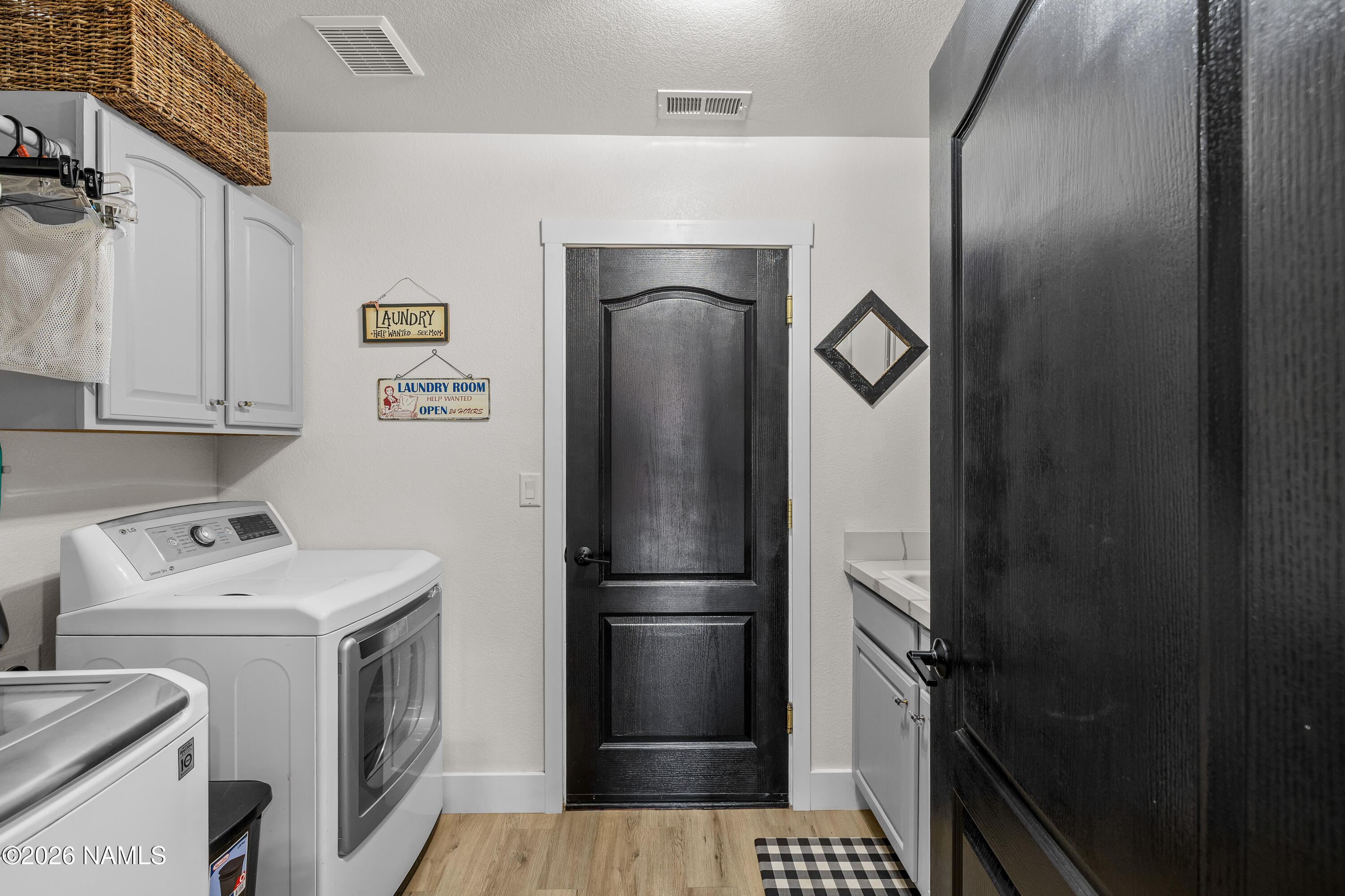 9534 North Aldrich Road Flagstaff, AZ 86004 - Photo 19 of 31 a utility room with dryer and washer