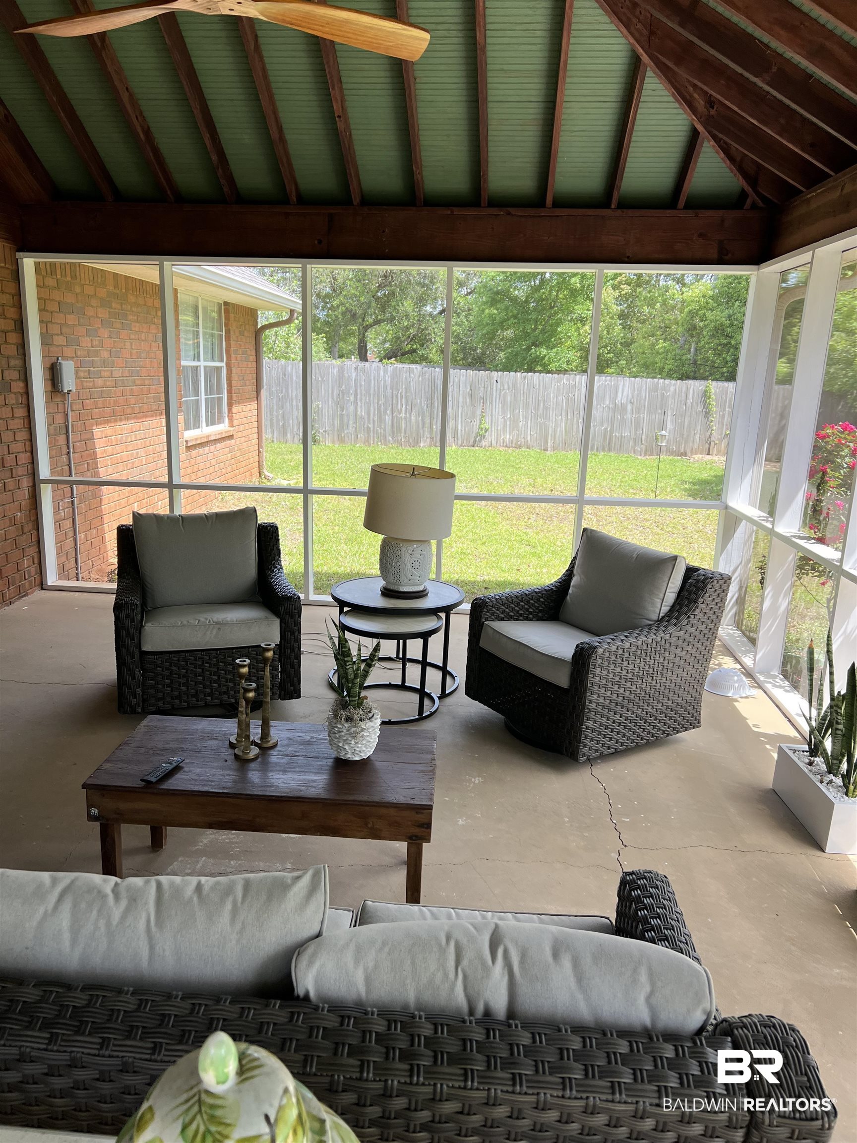119 Destrehan Road Fairhope, AL 36532 - Photo 36 of 38 Sunroom featuring outdoor lounge area, vaulted ceiling, and a ceiling fan