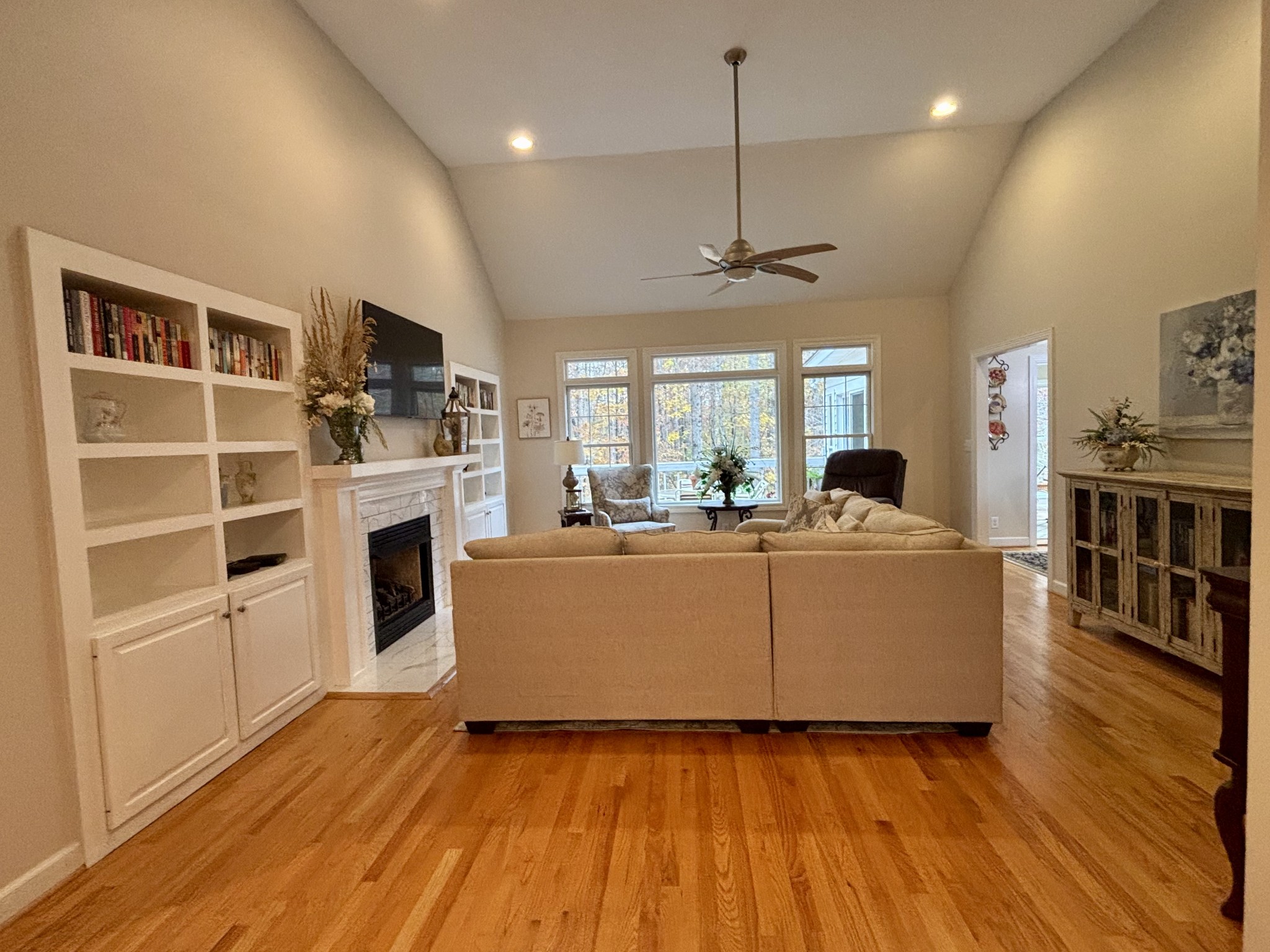 498 Dearman Street Smithville, TN 37166 - Photo 13 of 39 a living room with furniture and a fireplace