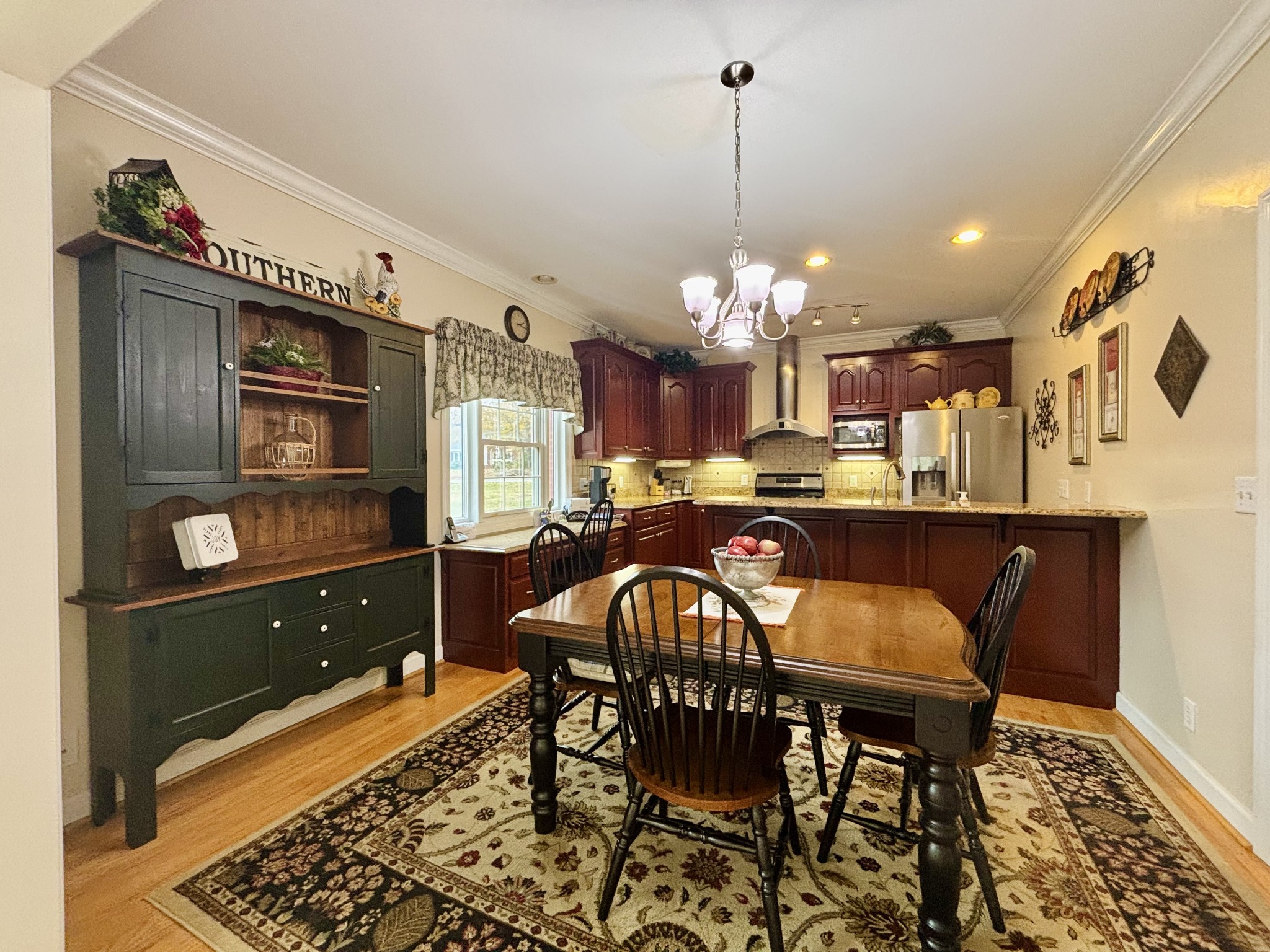 498 Dearman Street Smithville, TN 37166 - Photo 20 of 39 a view of a dining room with furniture and chandelier