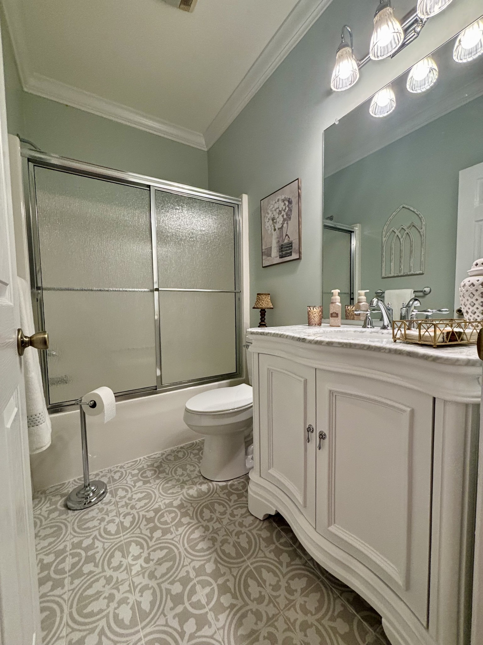 498 Dearman Street Smithville, TN 37166 - Photo 28 of 39 a bathroom with a sink a toilet and mirror