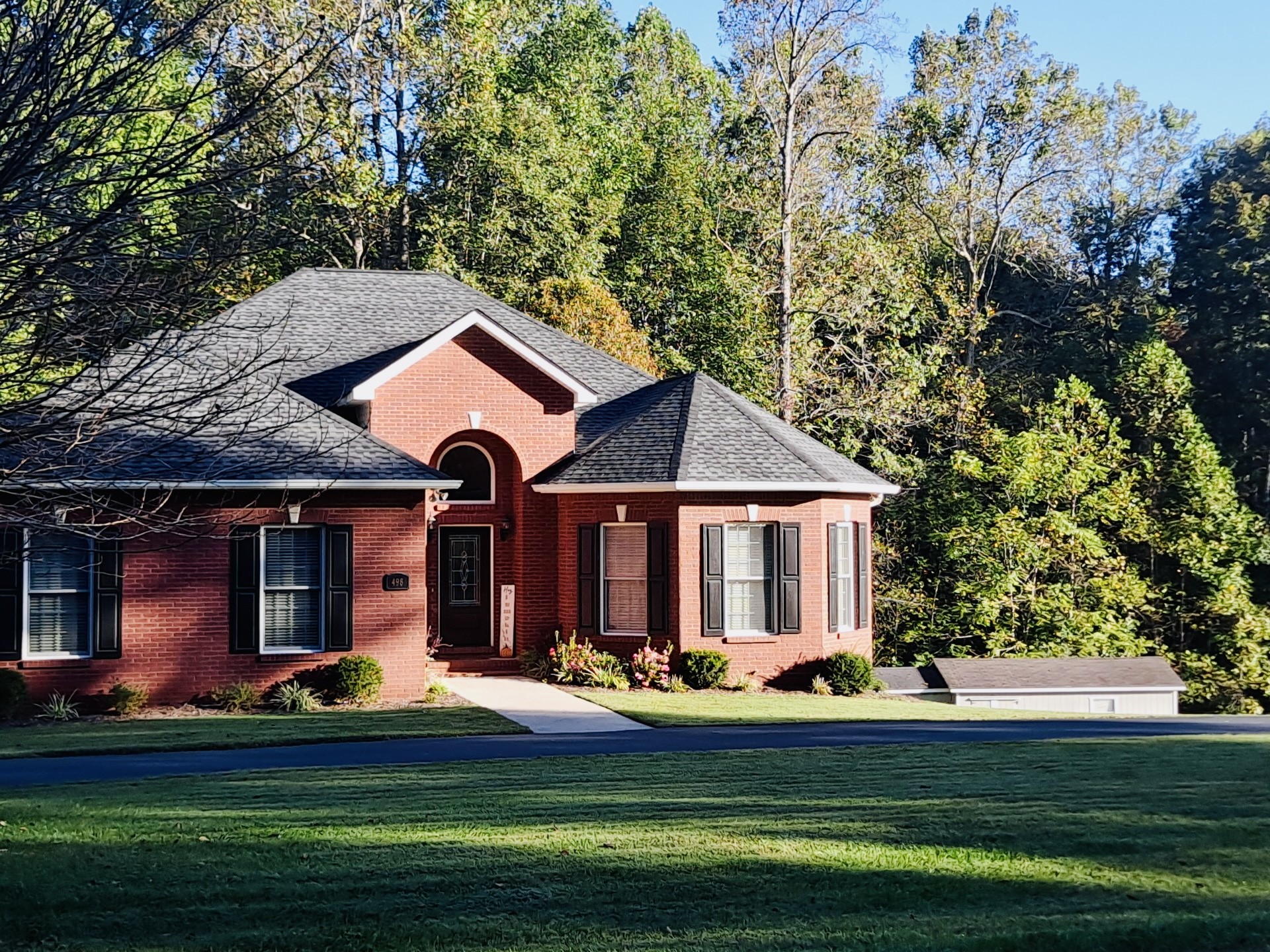 498 Dearman Street Smithville, TN 37166 - Photo 3 of 39 a front view of a house with a yard