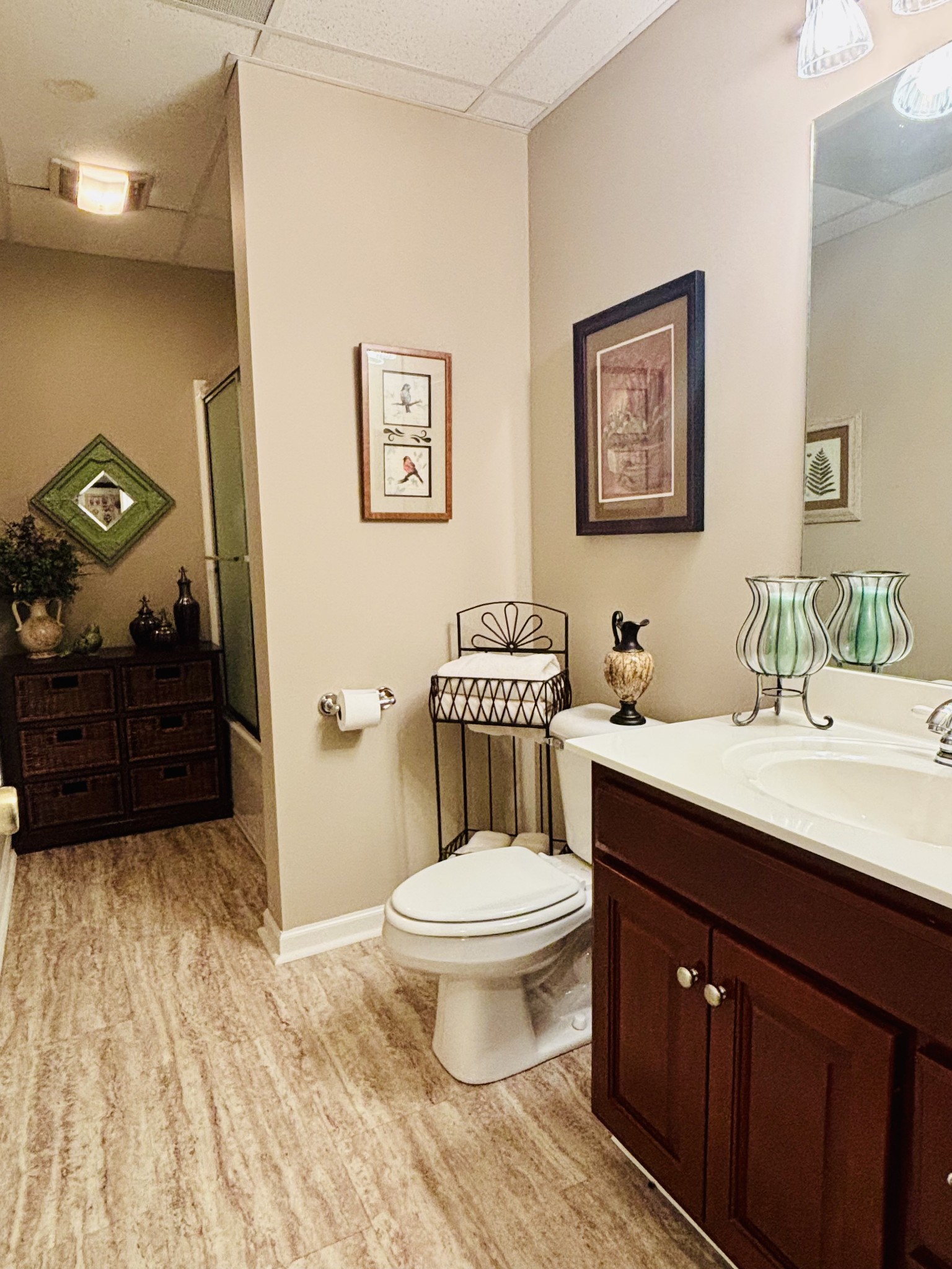 498 Dearman Street Smithville, TN 37166 - Photo 31 of 39 a bathroom with a toilet a sink and mirror