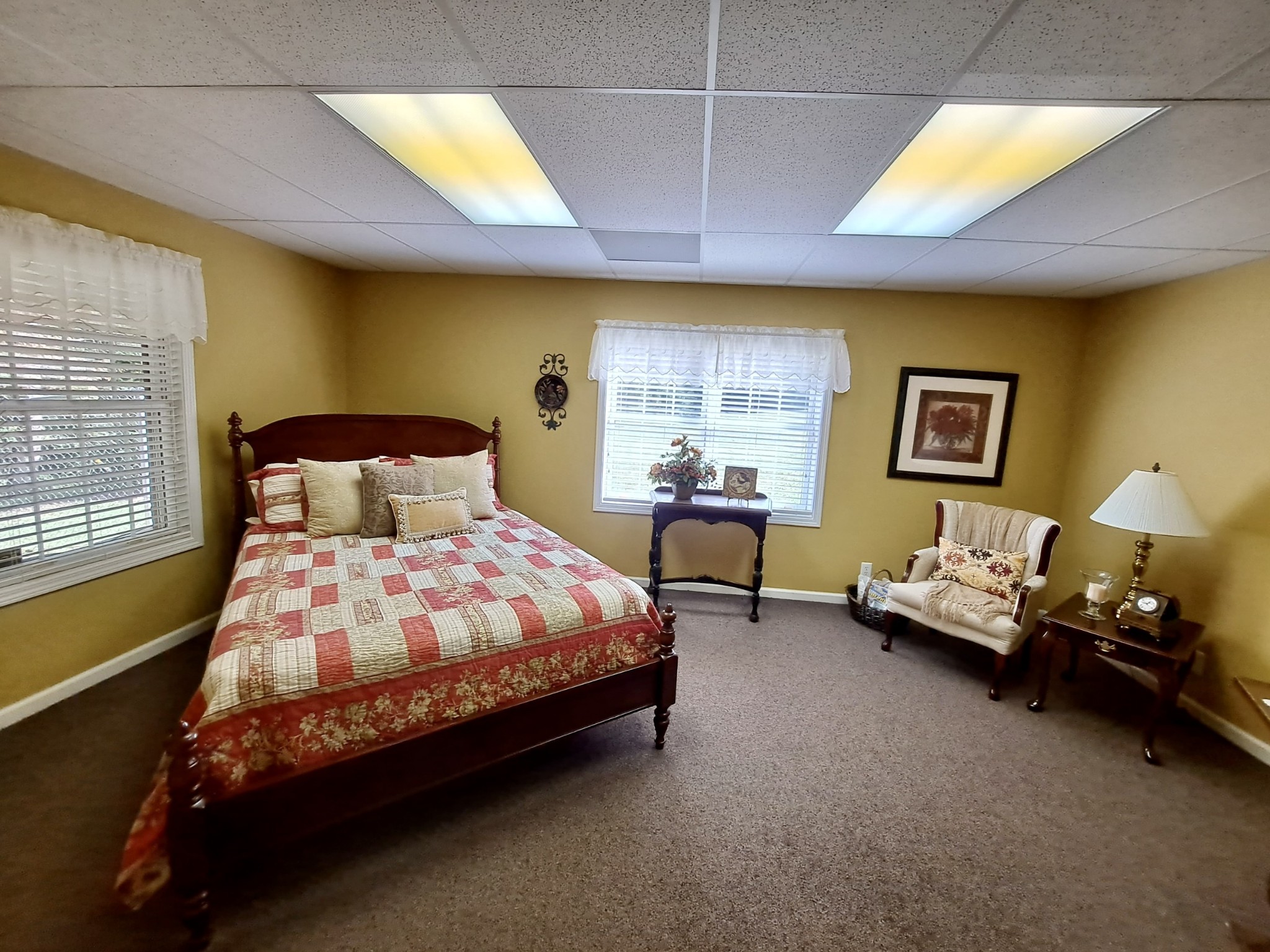 498 Dearman Street Smithville, TN 37166 - Photo 32 of 39 a bedroom with a bed and a chandelier