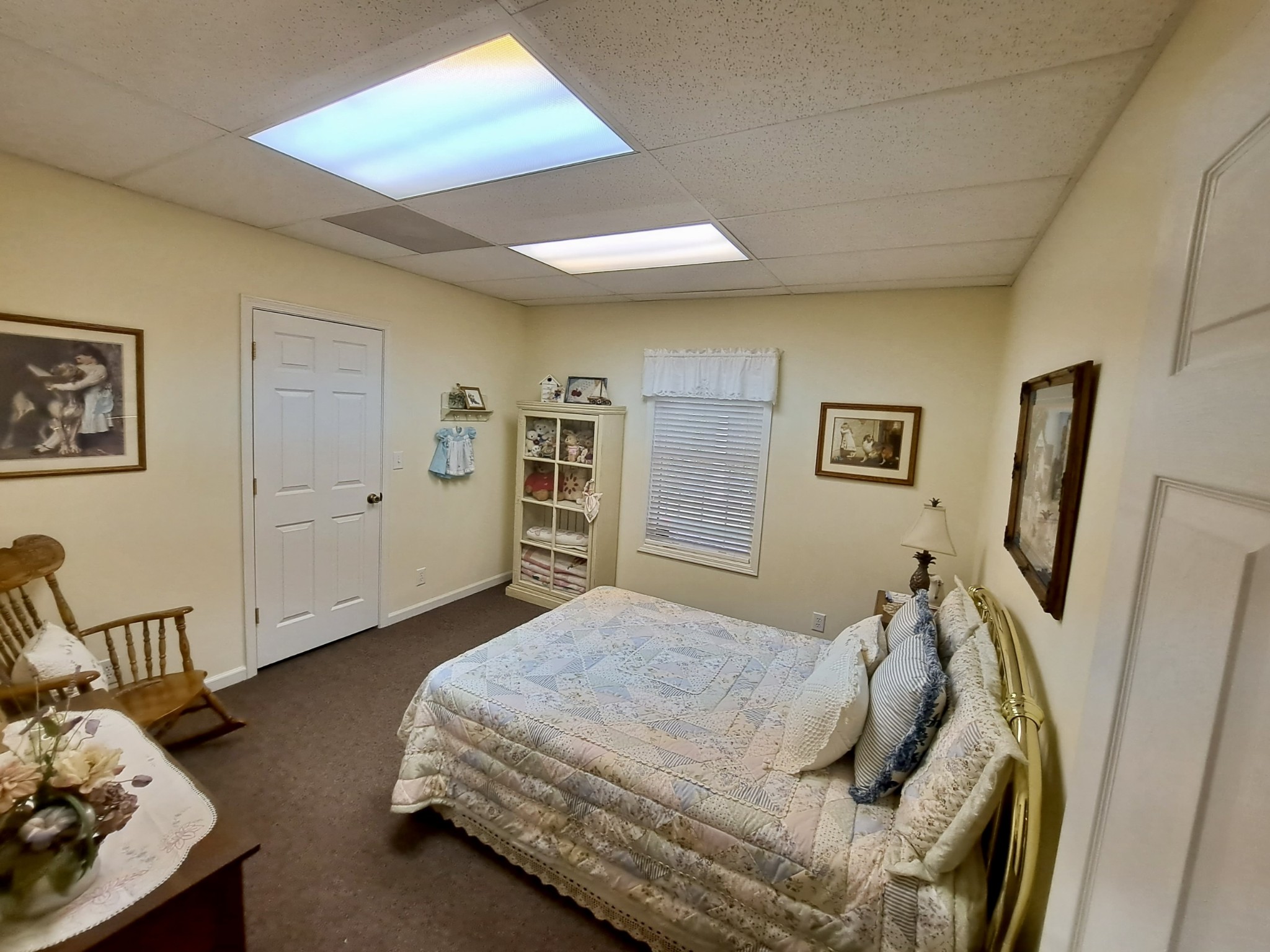 498 Dearman Street Smithville, TN 37166 - Photo 34 of 39 a bedroom with bed and a walk in closet