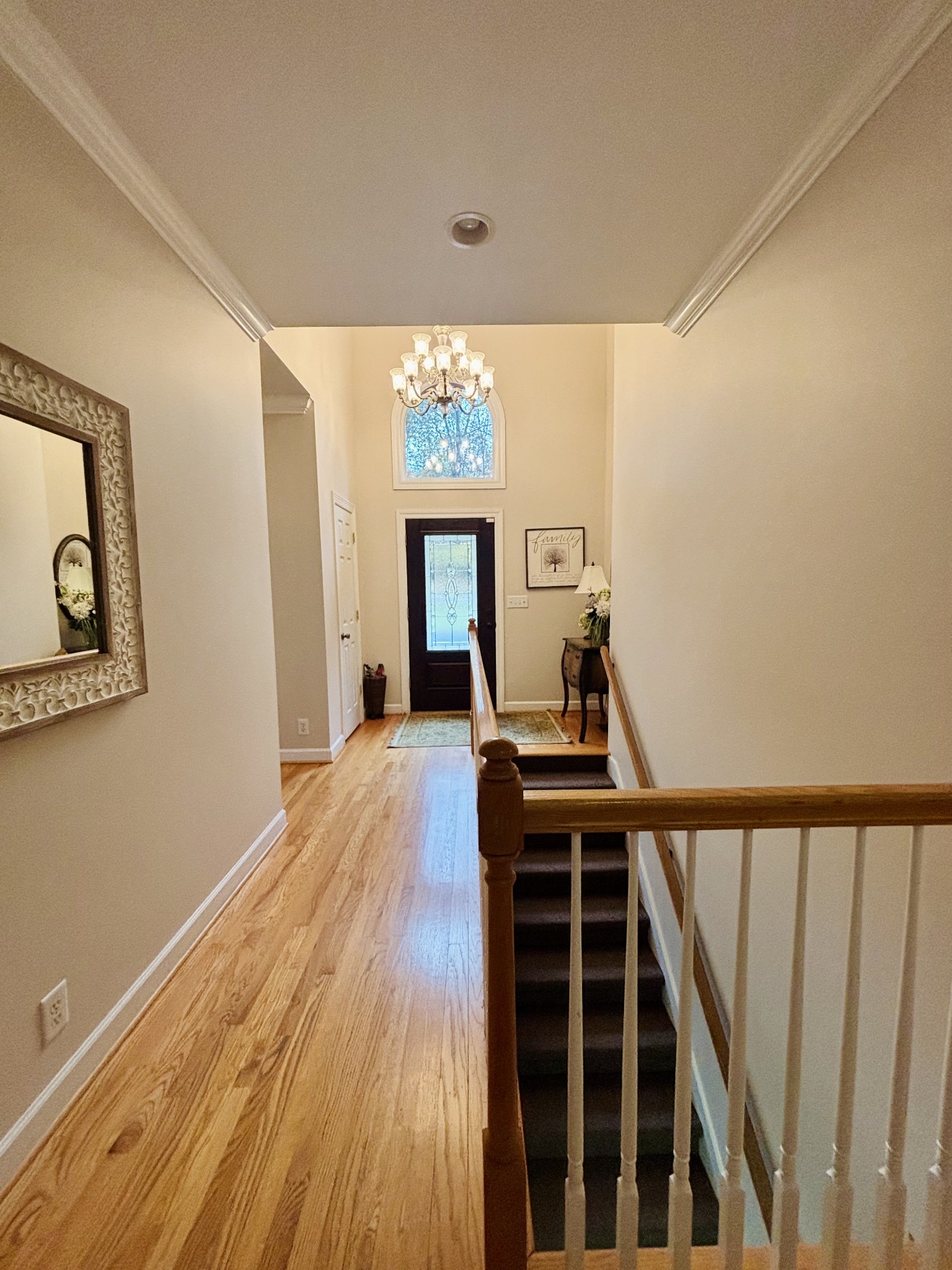 498 Dearman Street Smithville, TN 37166 - Photo 8 of 39 a view of a hallway with workspace and wooden floor