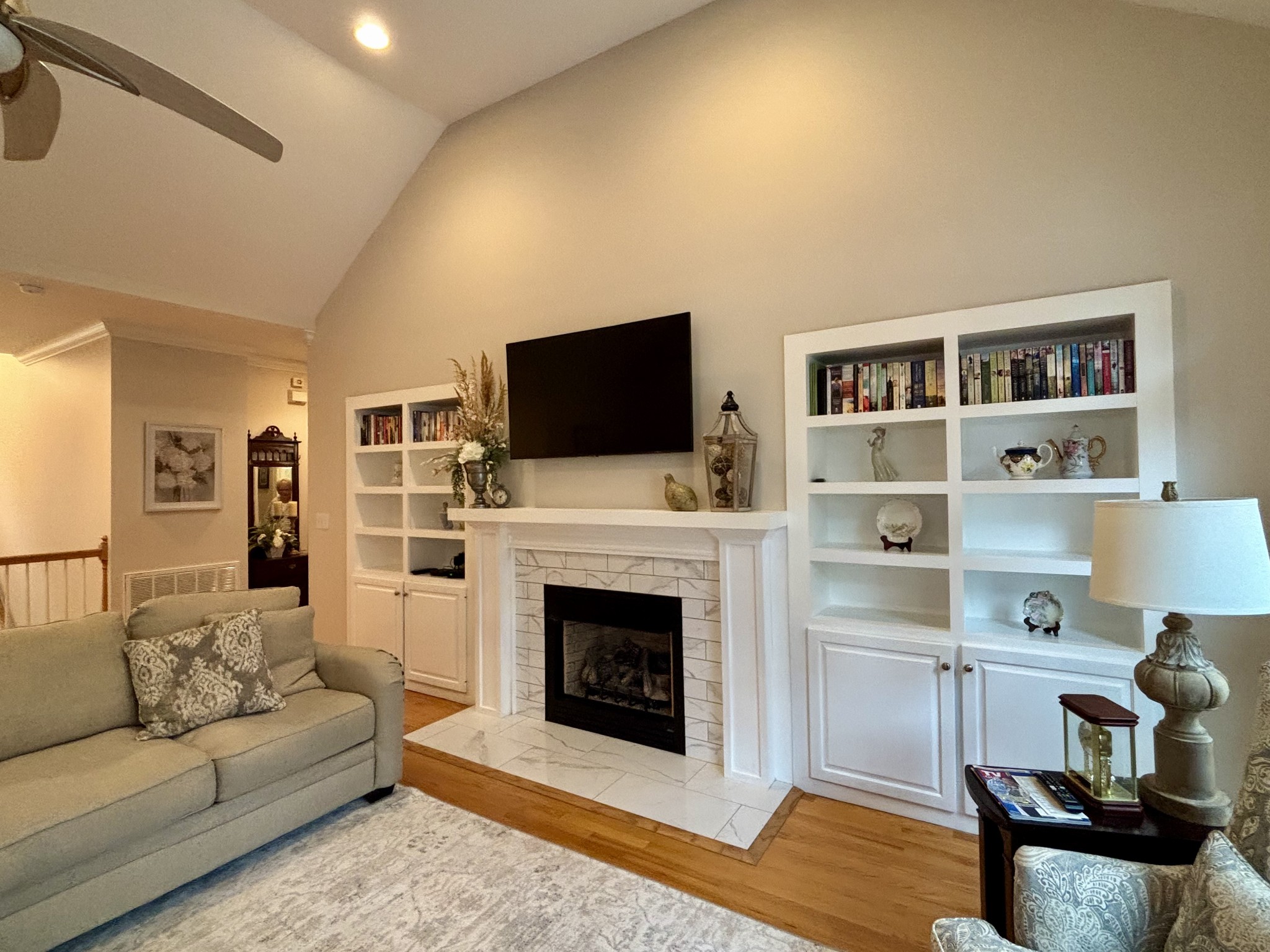 498 Dearman Street Smithville, TN 37166 - Photo 9 of 39 a living room with furniture and a fireplace