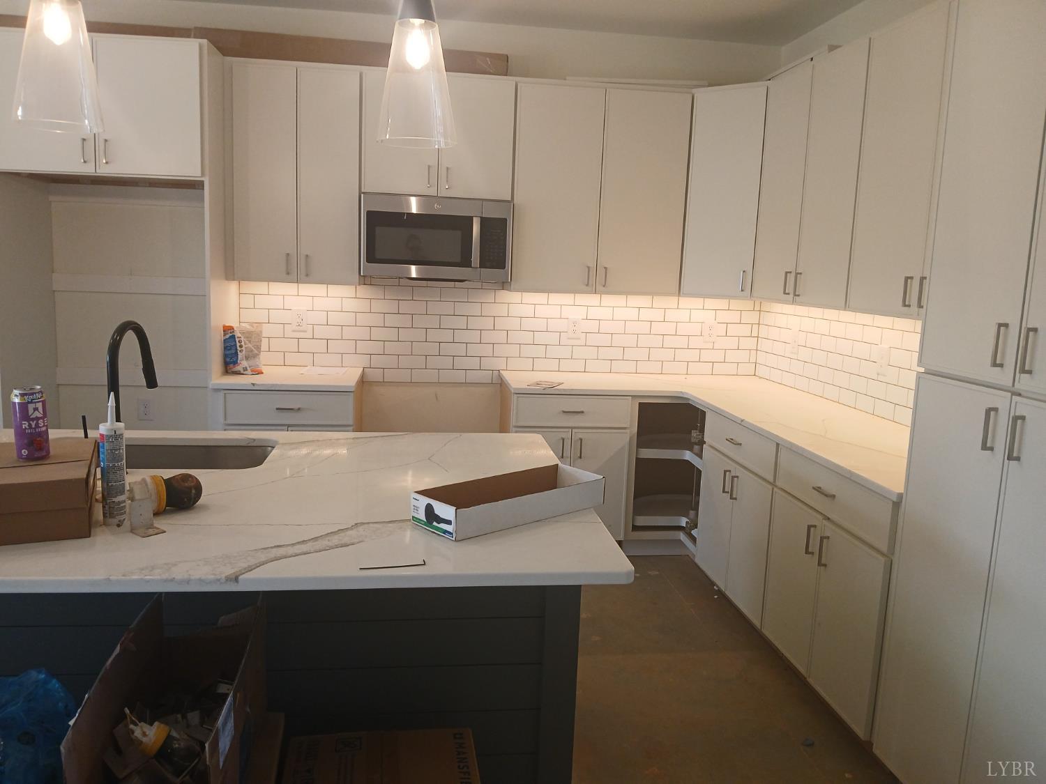 14 Faith Court Rustburg, VA 24588 - Photo 6 of 20 a kitchen with a sink cabinets and appliances