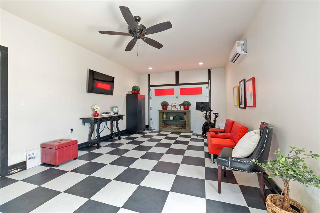 1010 Fm 583 Street West Rising Star, TX 76471 - Photo 12 of 40 a room with furniture and a projector