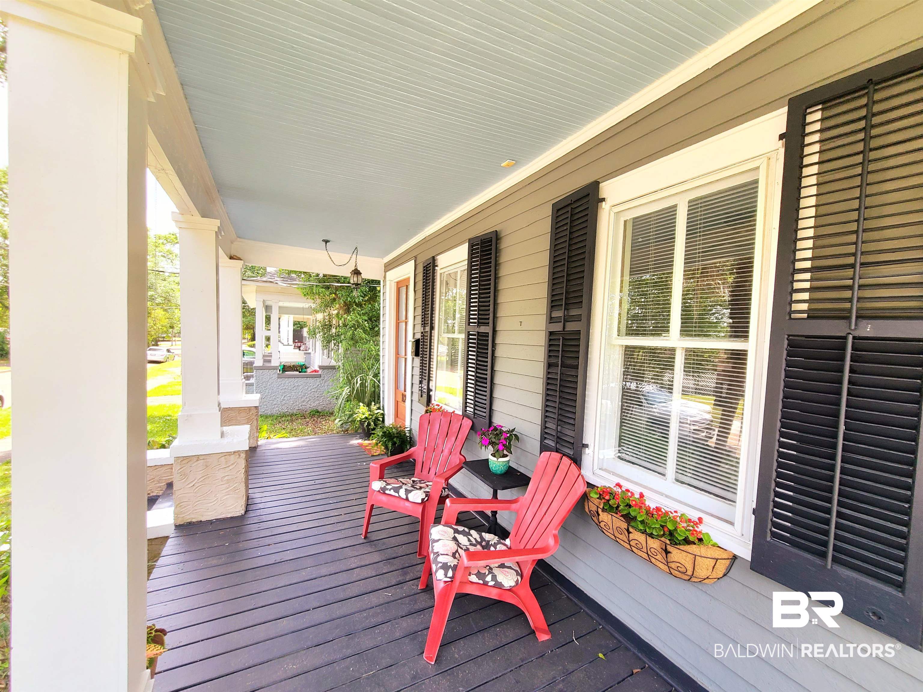 112 Espejo Street Mobile, AL 36604 - Photo 3 of 20 Wooden deck featuring a porch