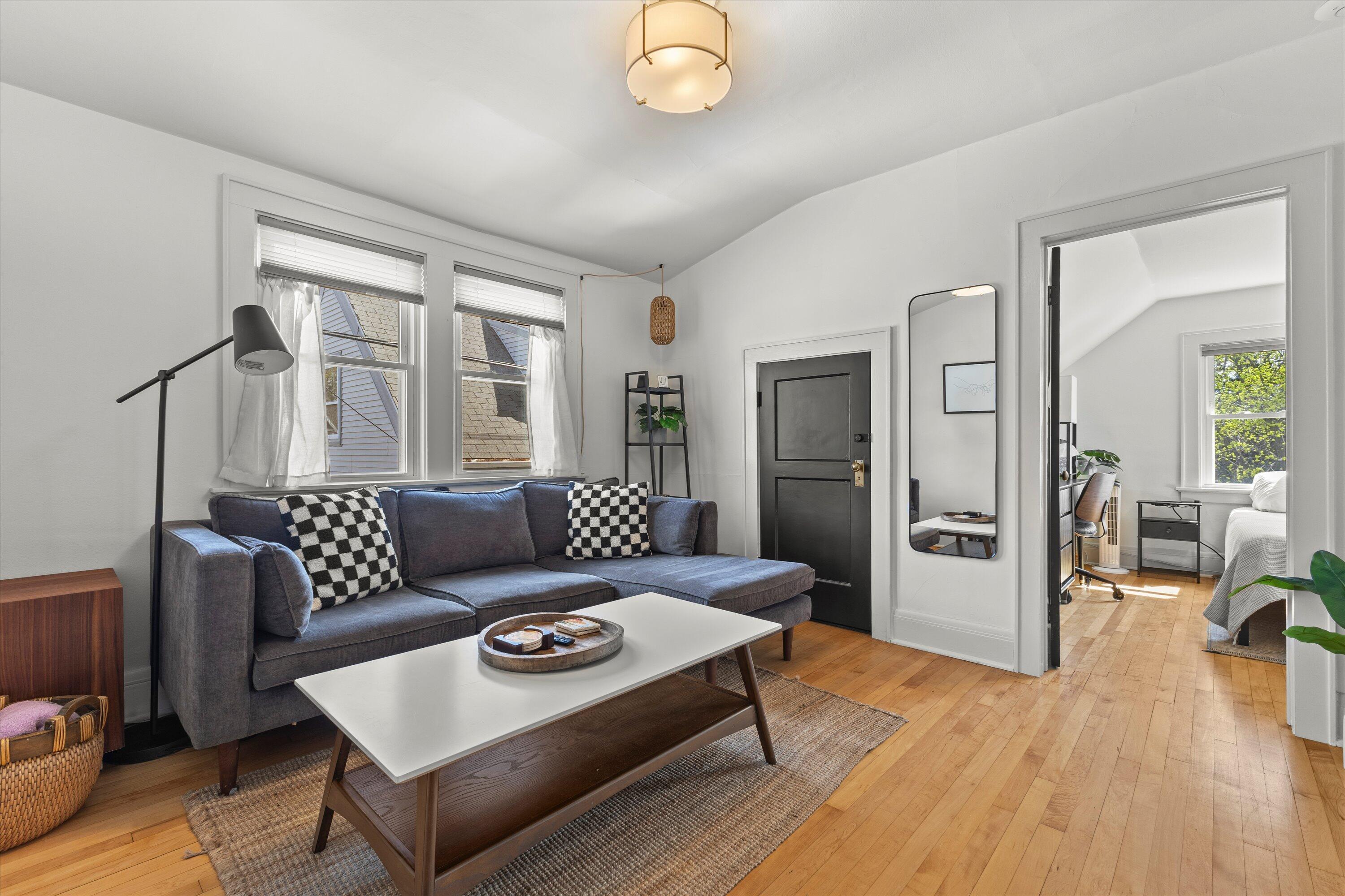 159 North 59th Street Milwaukee, WI 53213 - Photo 3 of 34 Bright and welcoming living space with hardwood floors